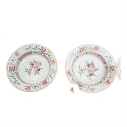 Pair of 18th century Chinese Export famille rose porcelain dishes, enamelled with figures and children in a garden setting within an iron red quatrefoil border, D12cm, together with three famille rose plates, D23cm and two bowls (7)