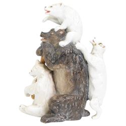 Porcelain model of a bear and cubs, possibly Russian, bearing Gardener marks beneath, and a large pottery model of a parrot, indistinct impressed marks beneath, H35cm (2)