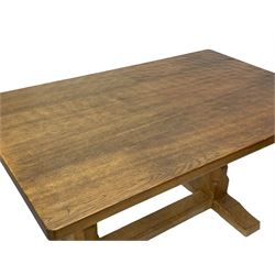 Mouseman - oak dining table, rectangular adzed top with rounded corners, octagonal pillar supports on sledge feet united by floor stretcher, carved with mouse signature, by the workshop of Robert Thompson, Kilburn