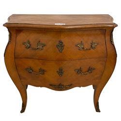 Late 20th century French design walnut bombe chest, shaped moulded top with quarter-matched veneers within crossbanding, fitted with two drawers with foliate cast metal handles and escutcheons, on tapering supports with ornate cast caps 