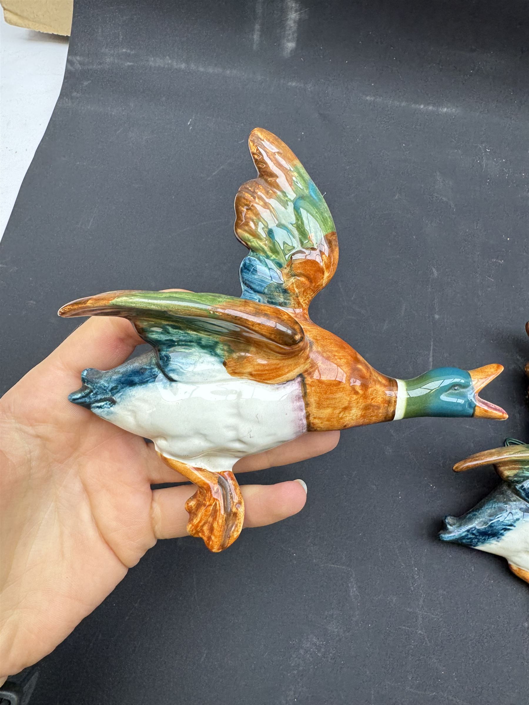 Set of three Beswick wall mounted graduated Flying Ducks, nos 596-2, 596-3, and 596-4