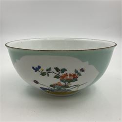 18th century Meissen turquoise ground bowl, circa 1740, decorated with two shaped reserves painted with Kakiemon type flowers, with gilt rim and band to short circular foot, with undergaze blue crossed swords mark to base, H7cm D15.5cm