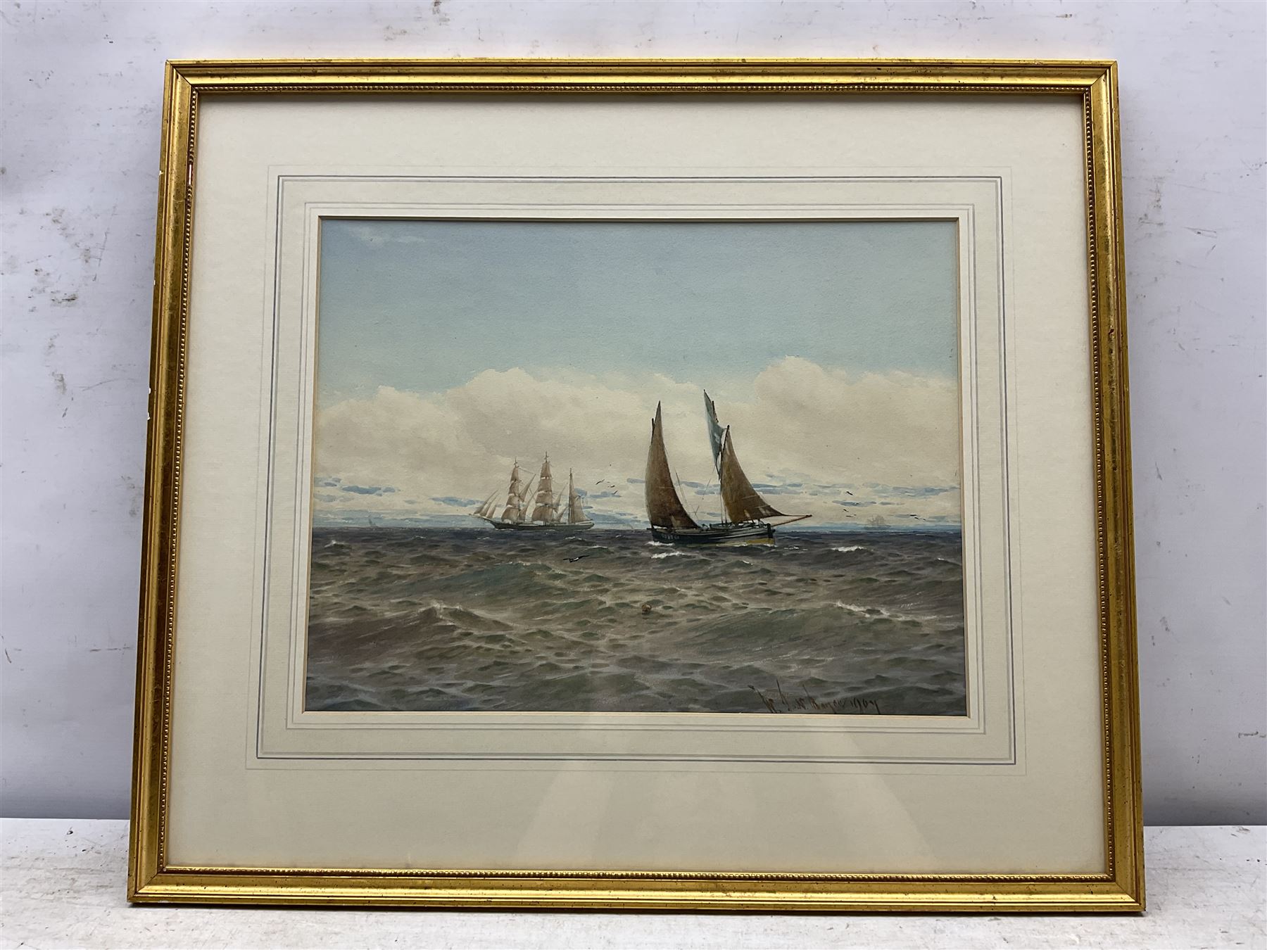 William Thomas Nichols Boyce (British 1858-1911): Tall Ship and Yawl off the Coast, watercolour signed and dated 1907, 32cm x 42cm