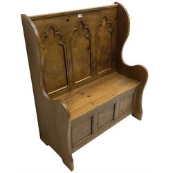 20th century pine hall bench or settle, the back with three Gothic design tracery panels over hinged box seat
