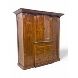 Art Nouveau period mahogany combination wardrobe, projecting moulded cornice, central two ...