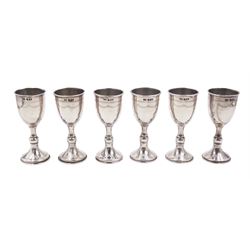 Set of six 1920s silver Kiddush cups, of goblet form with knopped stem, and engraved foliate detail, hallmarked London 1929, maker's mark M.S, H9cm