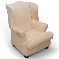 Georgian design mahogany framed wingback armchair, high shaped back over rolled arms with sprung back and seat, on compressed bun feet, upholstered in calico