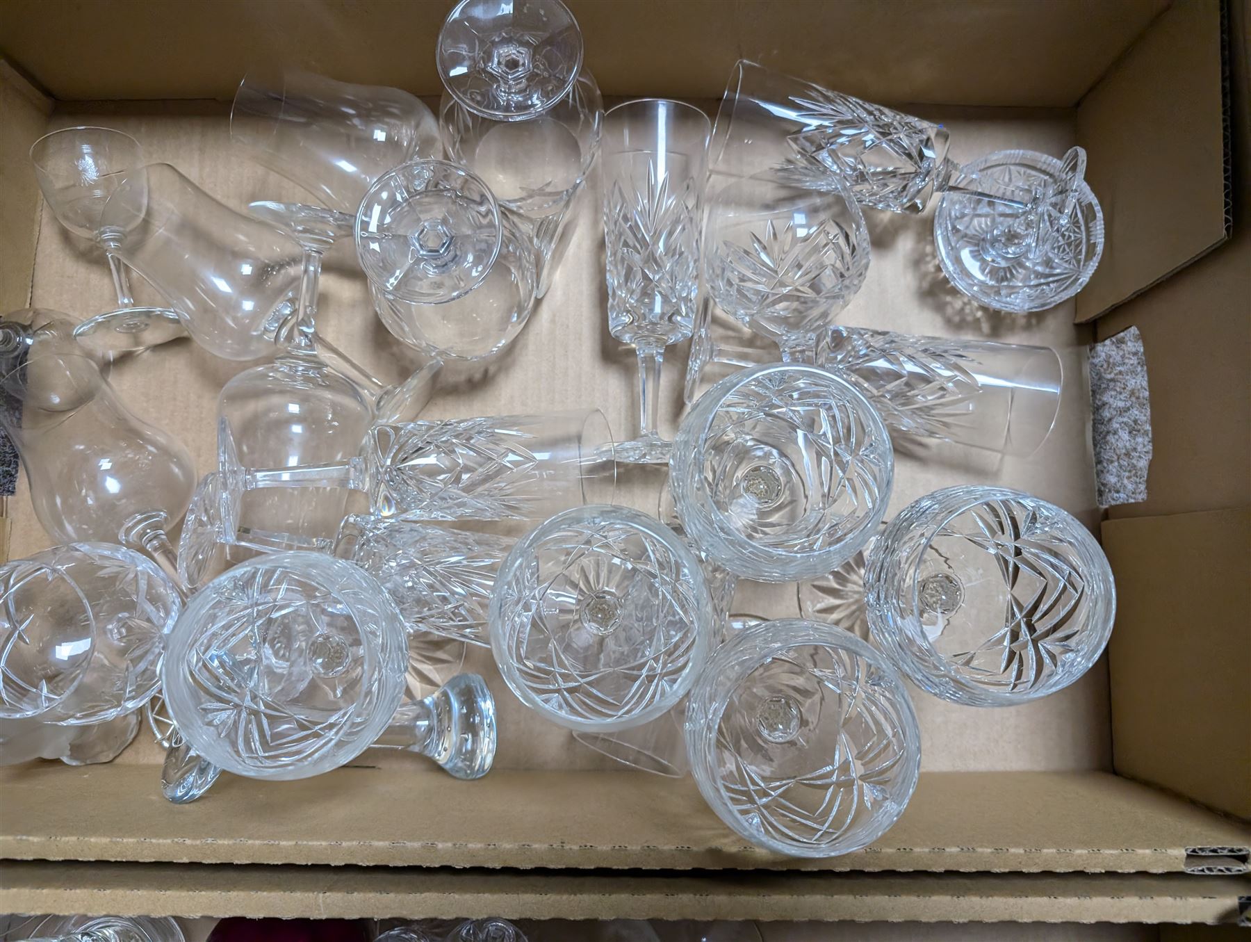 Large collection of glassware, including coloured and cut glass, in three boxes