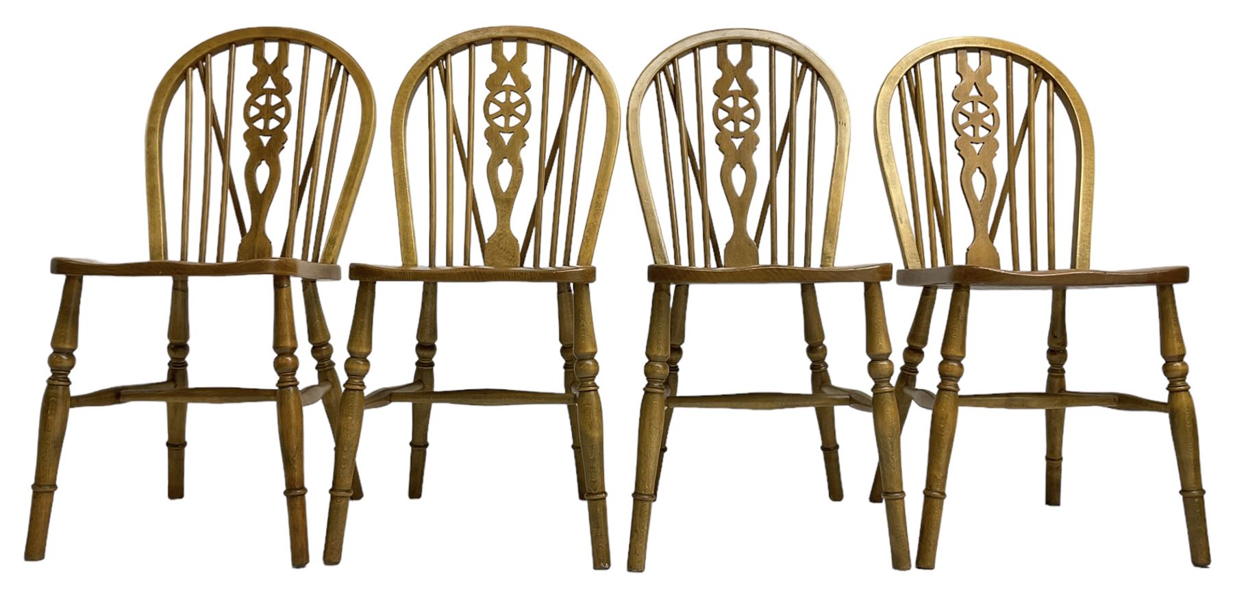 Set of four elm and beech wheelback dining chairs