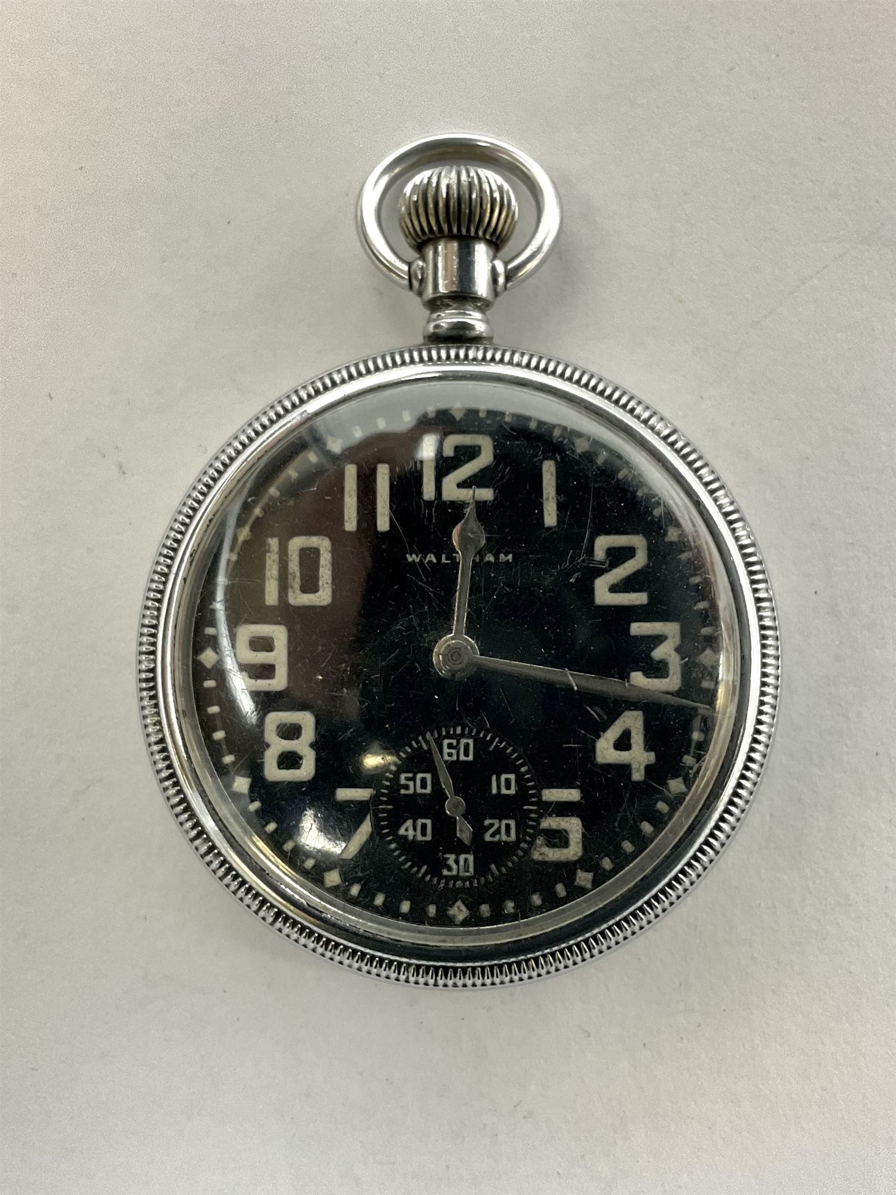 Waltham military open face pocket watch, with signed black dial and subsidiary seconds dial, the case back engraved with broad arrow and 30812907 