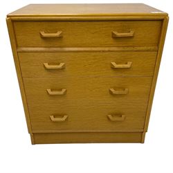 E. Gomme for G-Plan - 'Brandon' light oak chest, fitted with four long drawers, on skirted base