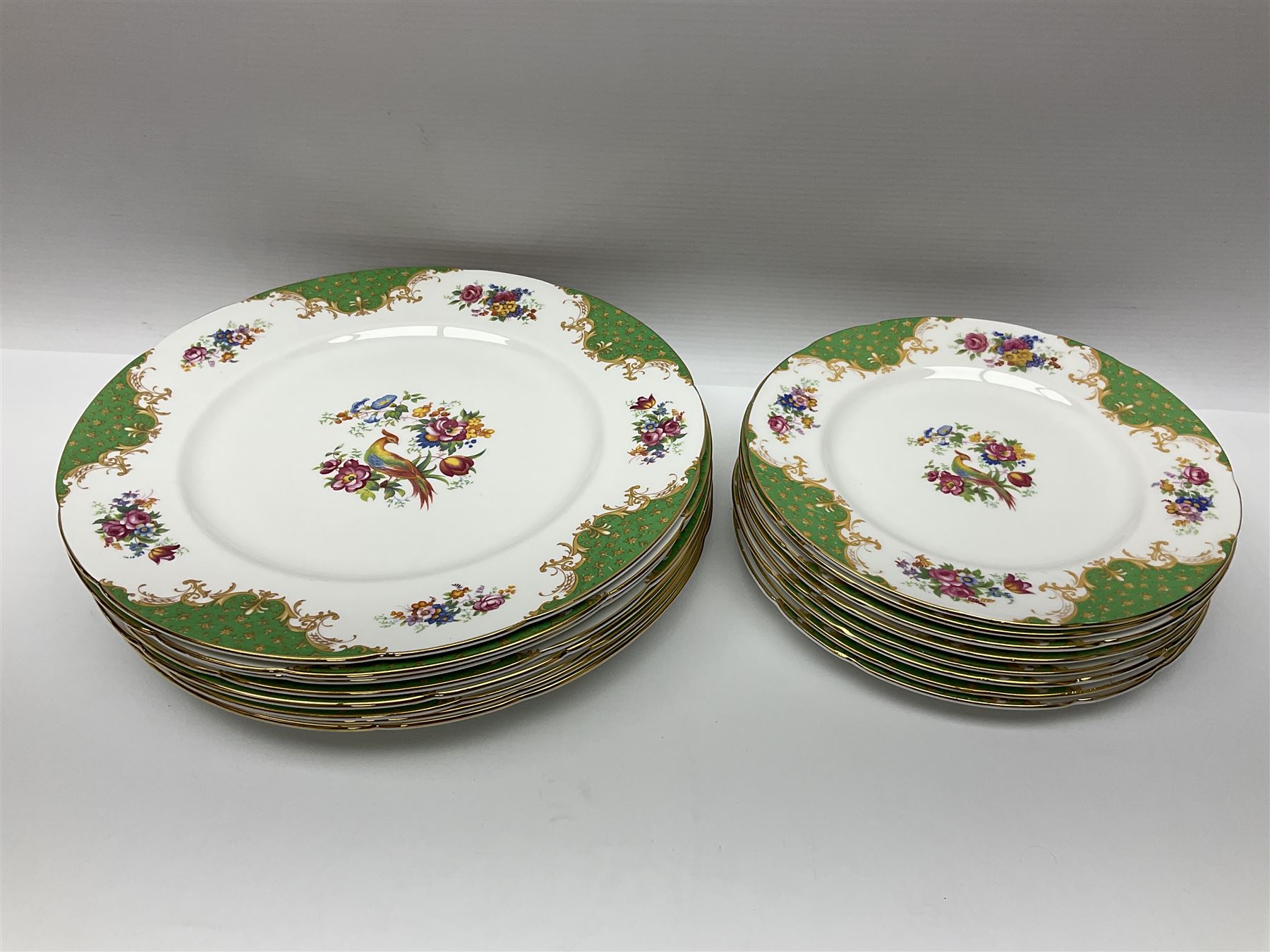 Paragon Rockingham pattern part tea and dinner service including eight cup and saucers of various sizes, eight dessert plates, eight dinner plates, etc (48)