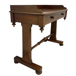 Victorian mahogany washstand, three-quarter raised gallery back, rectangular top with over two drawers, on shaped end supports united by ring-turned stretcher