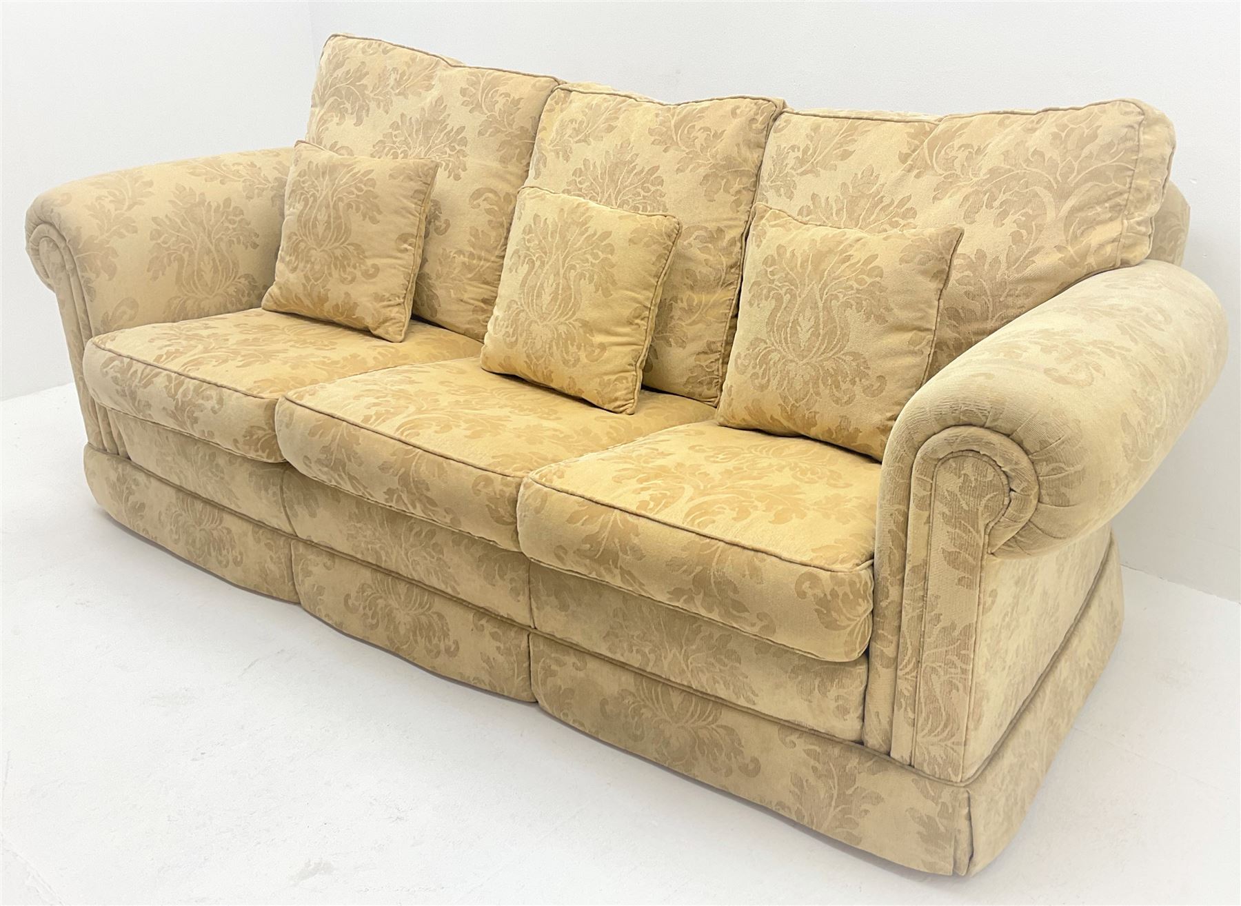 Duresta Waldorf Grande - three seat sofa (L230cm, D100cm) and matching armchair (W115cm, D100cm), scroll arms, upholstered in a pale gold foliate patterned fabric with matching scatter cushions 