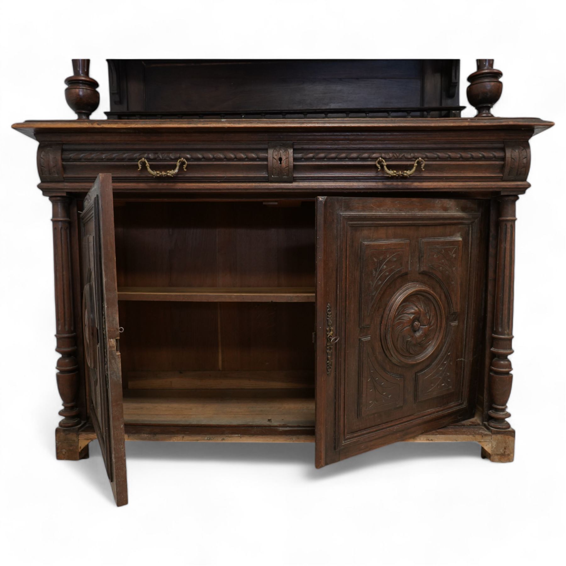 19th century Belgian buffet side cabinet, carved inn scene with figures, fitted with three cupboards, two drawers and two base cupboards