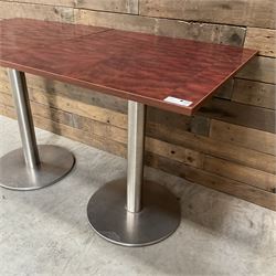 Two rosewood square restaurant tables, metal pedestal base