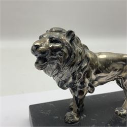 Silvered metal lion, upon a rectangular base, H12cm