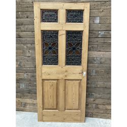 Early 20th century pine six panel door with later stained glass panels