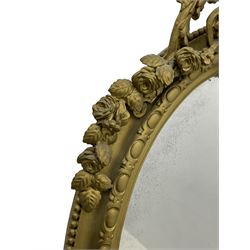 19th century giltwood and gesso girandole wall mirror, the raised pediment decorated with ribbon tie over curled acanthus leaves and flowerhead festoons, oval egg and dart moulded frame with outer bead, three projecting candle sconces in the form of scrolled acanthus leaves, lower shell motif with extending leaf decoration 