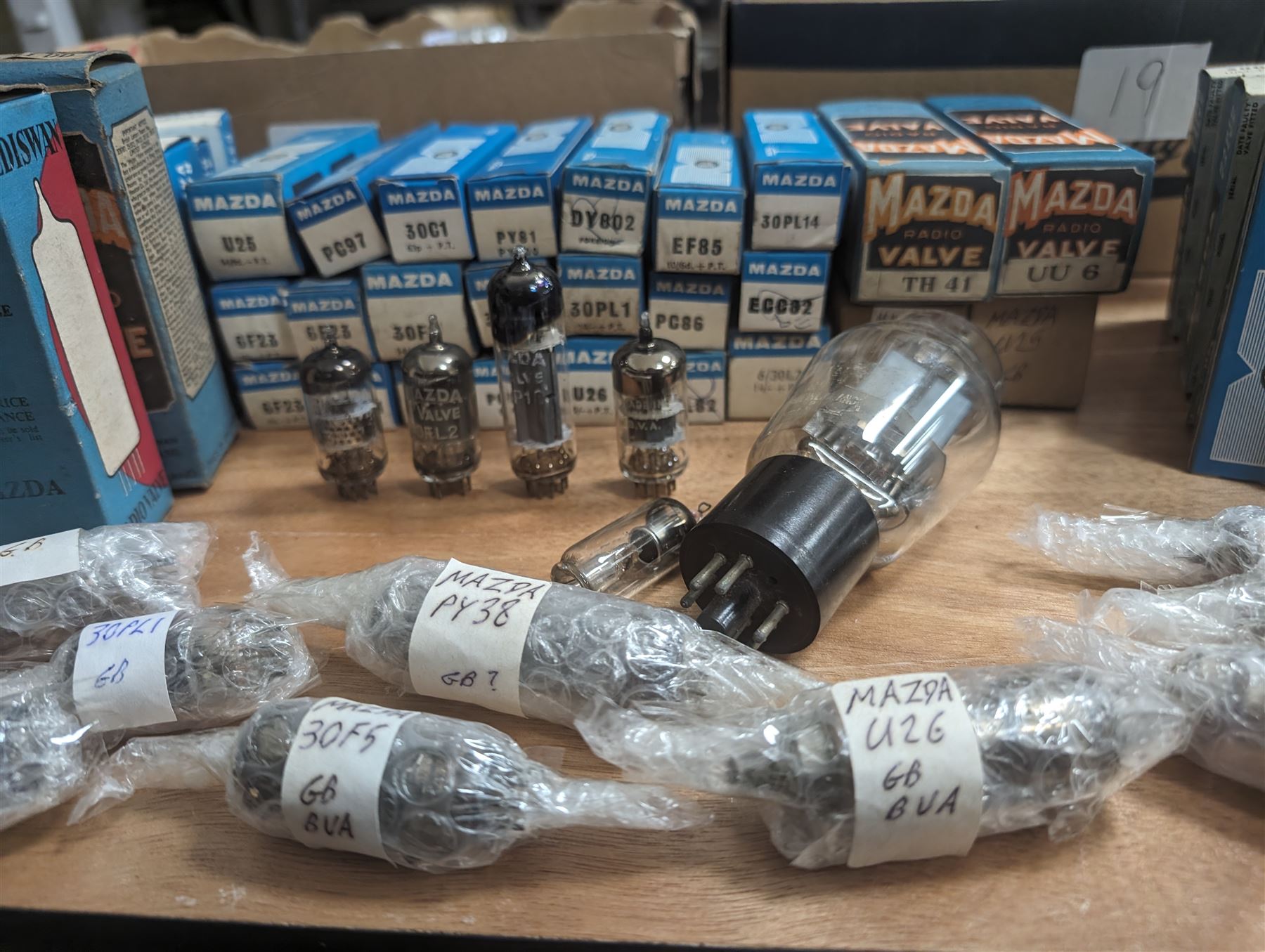 Large collection of Mazda thermionic radio valves/vacuum tubes, including boxed examples and loose bubble wrapped and identified examples