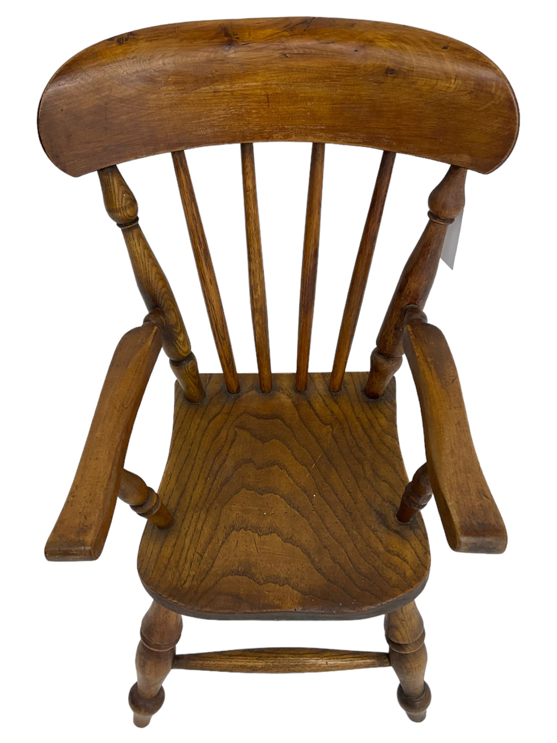 19th century elm and beech child's farmhouse chair, shaped cresting rail over stick back, on turned supports 