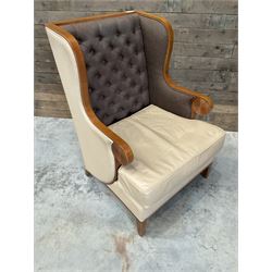 Walnut finish framed wing back armchair upholstered leather and buttoned fabric