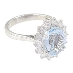 18ct white gold oval cut aquamarine and round brilliant cut diamond cluster ring, hallmarked, aquamarine approx 2.55 carat, total diamond weight approx 0.80 carat