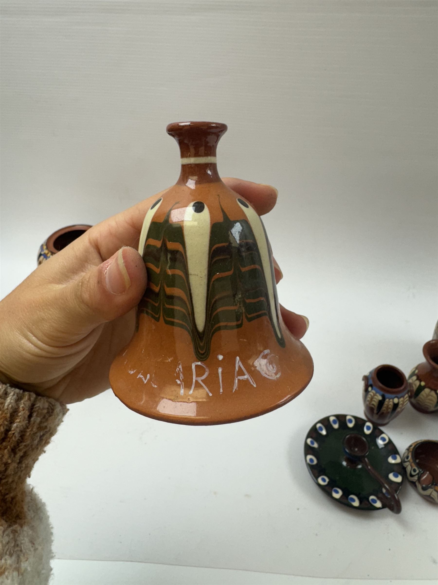 Collection of slipware, including miniature vases, baskets, candlesticks jugs etc 