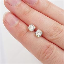 Pair of 18ct white gold round brilliant cut diamond stud earrings, stamped 750, total diamond weight approx 1.05 carat