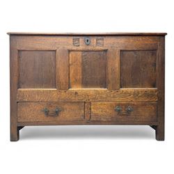 18th century oak mule chest, hinged top over panelled front, the frieze rail carved with t...