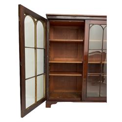 Early 20th century mahogany bookcase, fitted with two astragal glazed doors enclosing three adjustable shelves