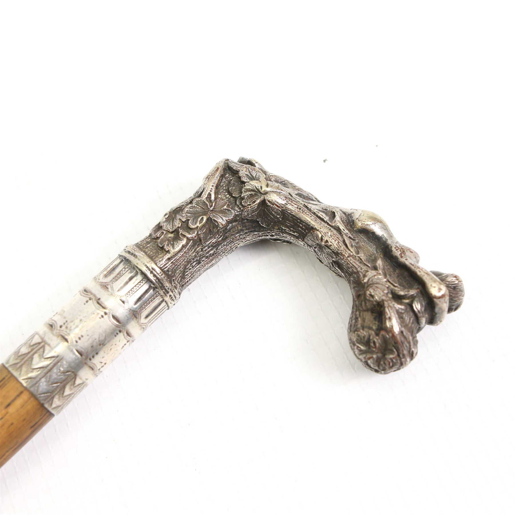 Art Nouveau silver-plated walking cane, the handle depicting a reclining female nude amongst fruiting vines, L87cm 