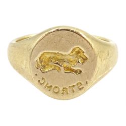 Mid 20th century 9ct gold intaglio signet ring, engraved 'strong' with lying dog above, London 1948