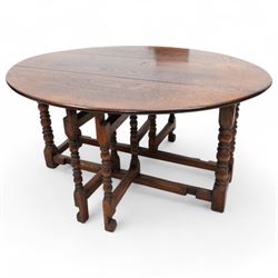 17th century design oak dining table, oval drop-leaf top over double gate-leg action base,...