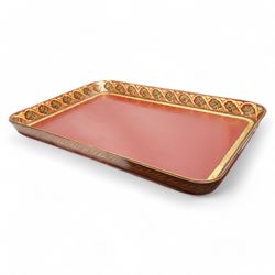 Regency red-japanned and parcel gilt papier-mâché tray, of rectangular form, decorated with a band of leaves and flowers, with trailing foliage to the exterior, L81cm x W59cm