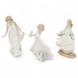 Three Lladro figures, comprising Kittens Gathering no 6941, Cinderella no 4828 and Wonderf...