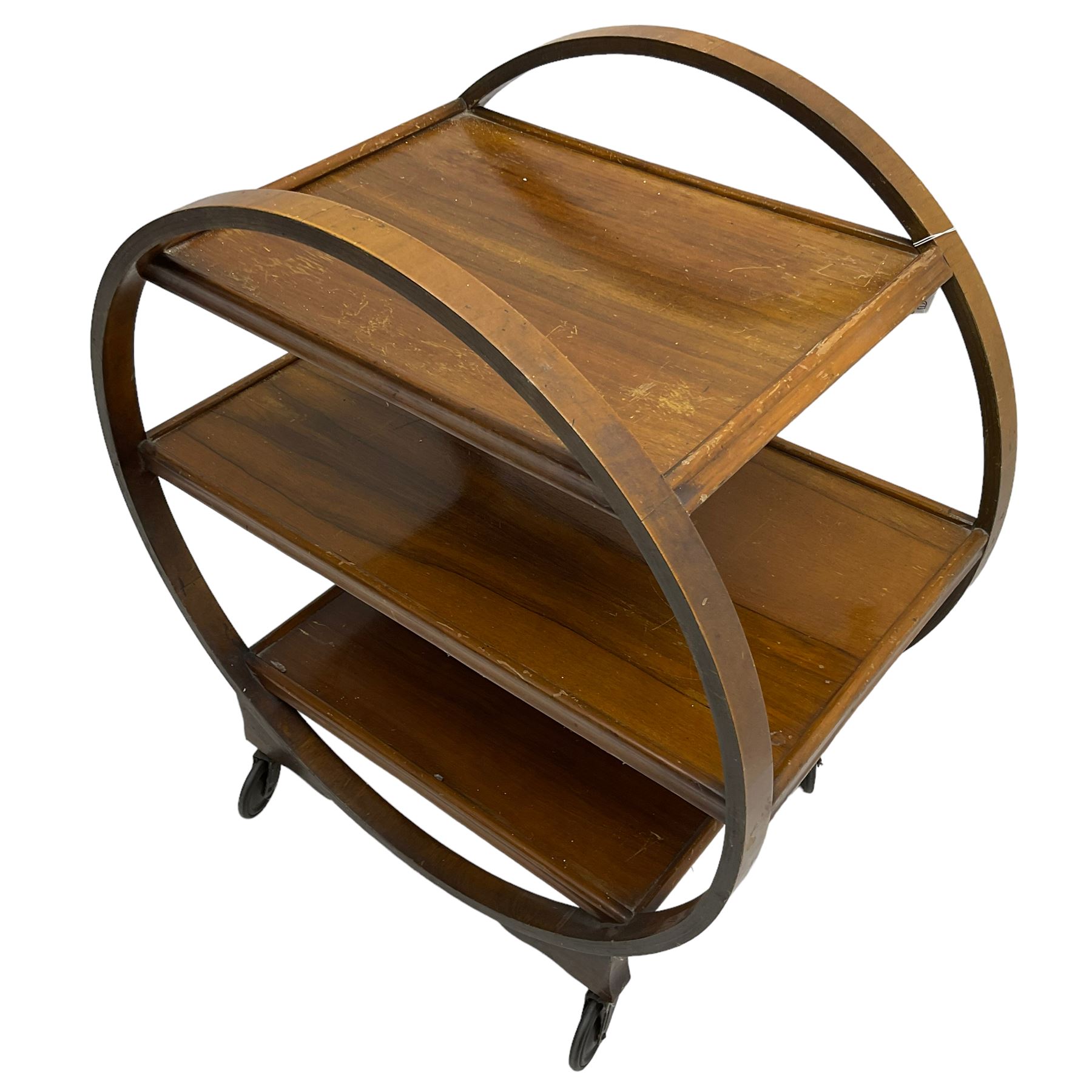 1930s Art Deco period walnut Moon drinks trolley, three tiers encased by two circular supports, raised on castors