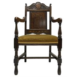 Late 19th to early 20th century oak elbow chair, the shaped cresting rail carved with scrolls and foliage, panelled back inlaid with parquetry work and central rampant lion within shield, upholstered seat, on turned supports joined by H stretchers