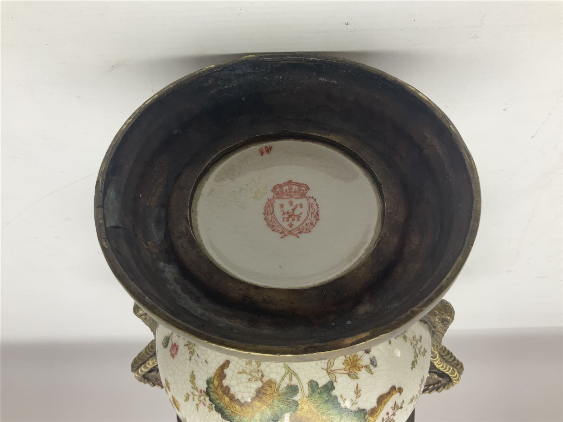 Wong Lee, twin handled ceramic urn with enamelled floral decoration and bronzed metal mounts, marked to base, height 33cm