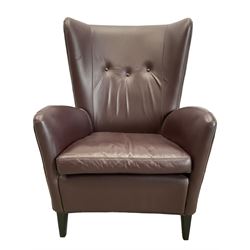 Wing back armchair upholstered in cocoa brown leather