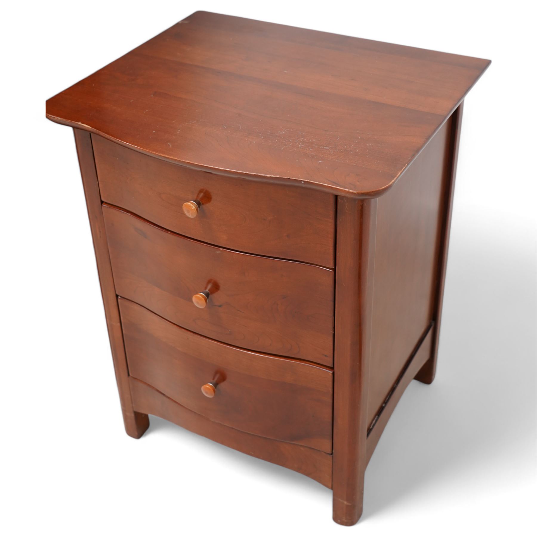 Willis & Gambier tall cherry wood serpentine front pedestal chest, fitted with five drawers, raised on square supports (W64cm D54cm H127cm); matching pair of bedside pedestal chests, fitted with three drawers (W52cm H66cm); and double headboard (W159cm) (4)