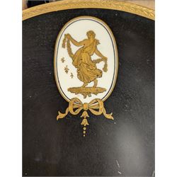 Pair of early 20th century Wedgwood tazzas, the black bowls with gilt foliate borders and painted in gilt with a classical female figure, with retailers mark for Phillip's Ltd Bond Street and printed maker's mark beneath, H6cm, D23.5cm