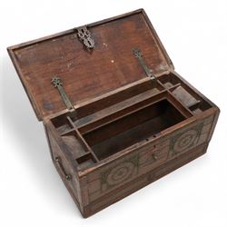 19th century Zanzibar teak and brass mounted chest, hinged lid enclosing divisions, the front decorated with studwork, carrying handles to each side 