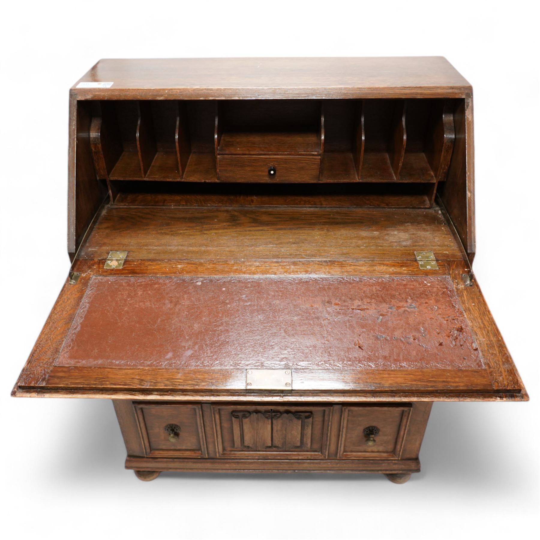 Mid-20th century oak bureau, fitted with fall front above three drawers