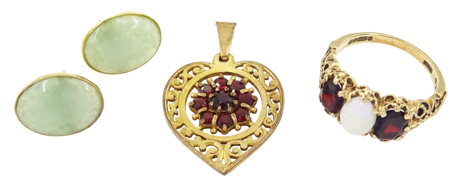 Gold three stone opal and garnet ring, gold garnet heart pendant, both hallmarked 9ct and a pair of 14ct gold jade stud earrings, stamped 585