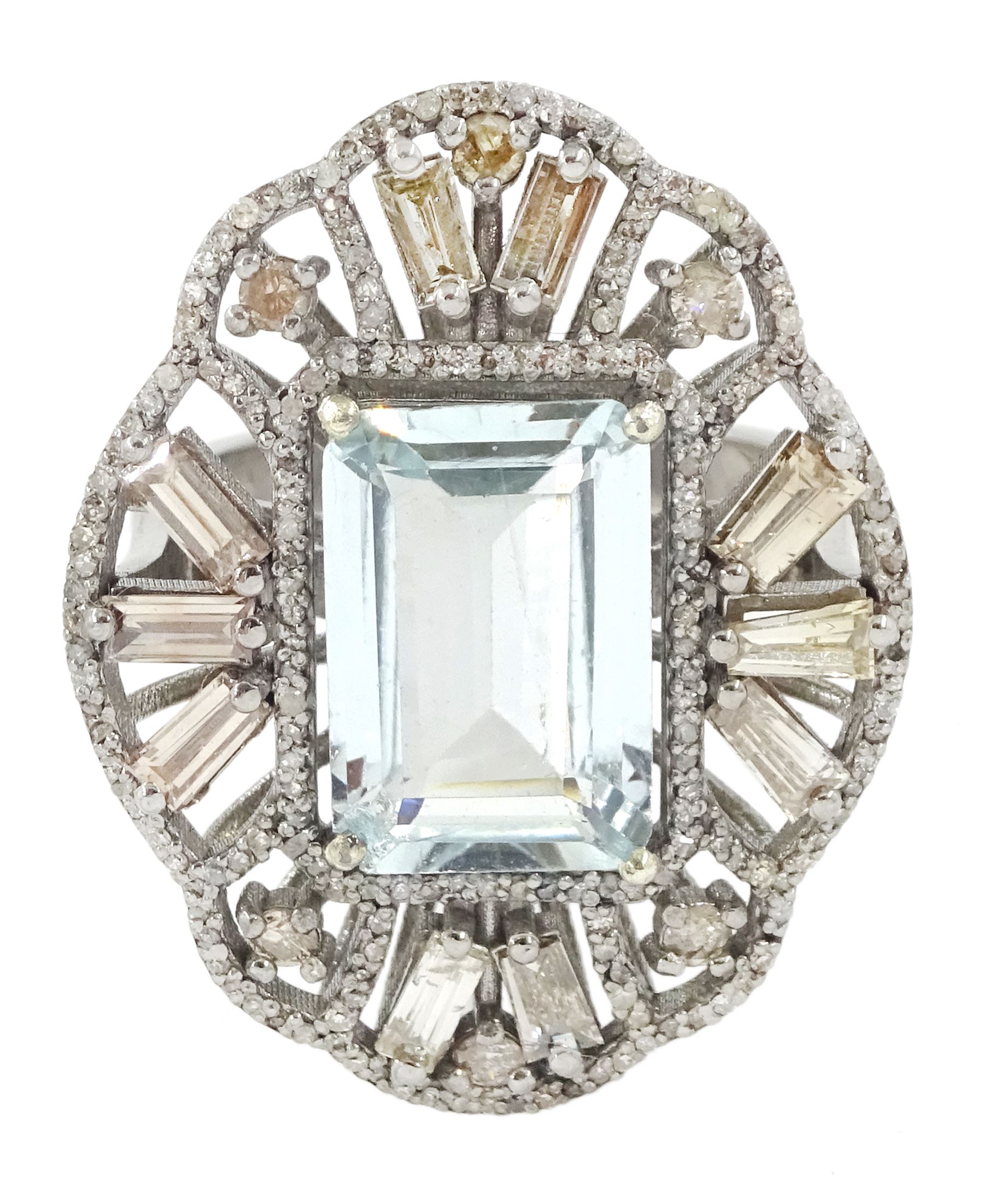 Large silver aquamarine and diamond pierced design ring, the central emerald cut aquamarine of approx 3.75 carat, with baguette and round brilliant cut diamond surround, total diamond weight approx 1.75 carat