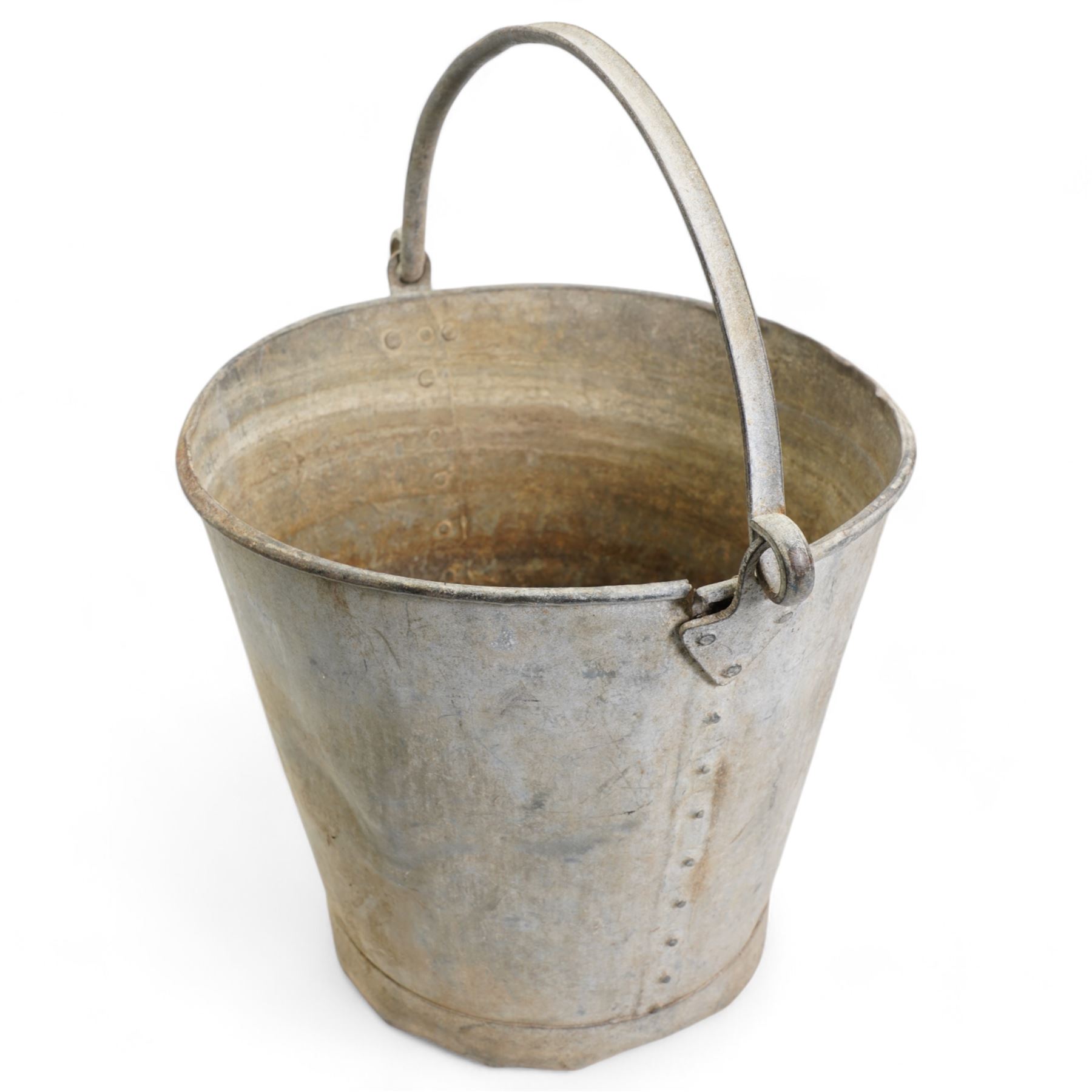 Two galvanised tin buckets, of conical riveted form with swing handles, H30cm