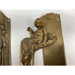 Art Nouveau bronze door handle modelled with a young merman holding a stylised fish, the plate decorated with geometric terminals, together with three repousse detail finger plates, largest L36cm