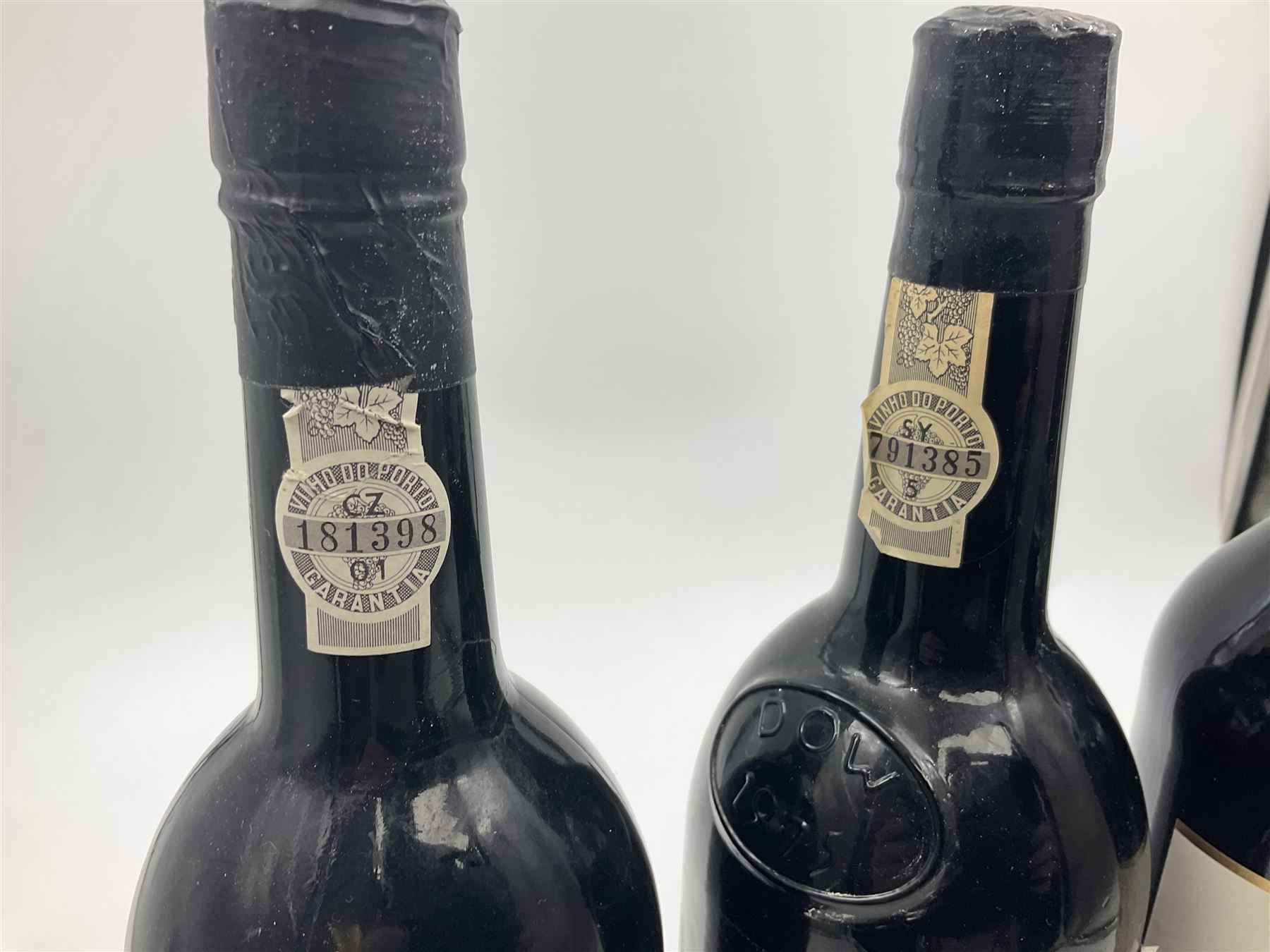 Four bottles Dow's port, comprising, 1975, 1979, Master Blend, and 2001 Quinta Do Bomfim, various contents and proof (4) 