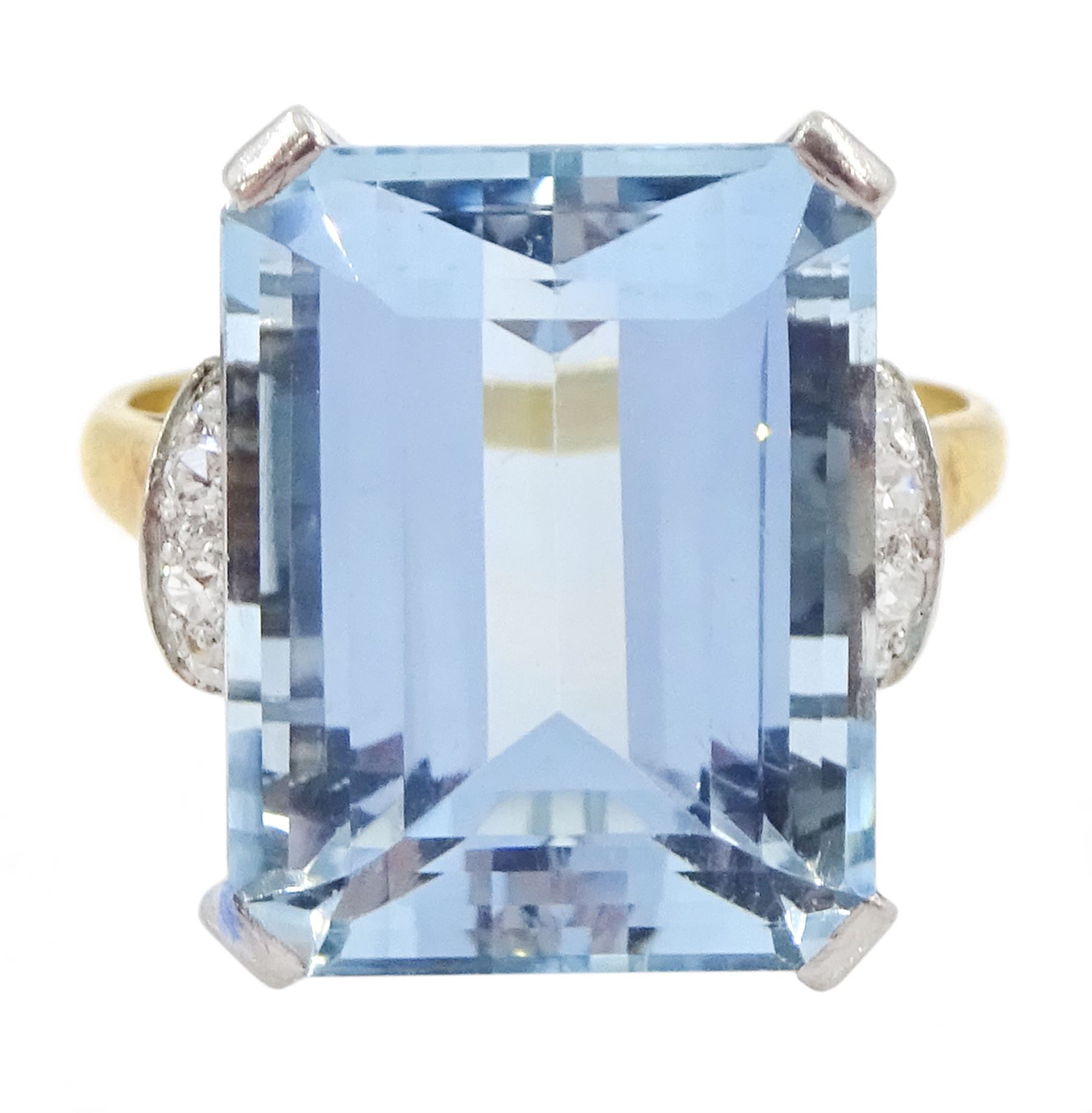 18ct gold single stone emerald cut aquamarine ring, with four channel set diamonds set either side, aquamarine approx 11.15 carat